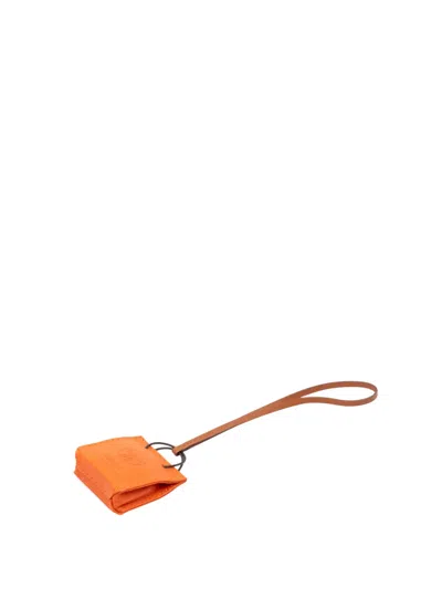 Pre-owned Hermes 2010-2025 Milo Lambskin And Swift Shopping Bag Charm Key Chain In Orange
