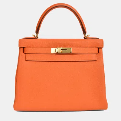 Pre-owned Hermes 2015 Orange Togo Leather Kelly 28 With Strap