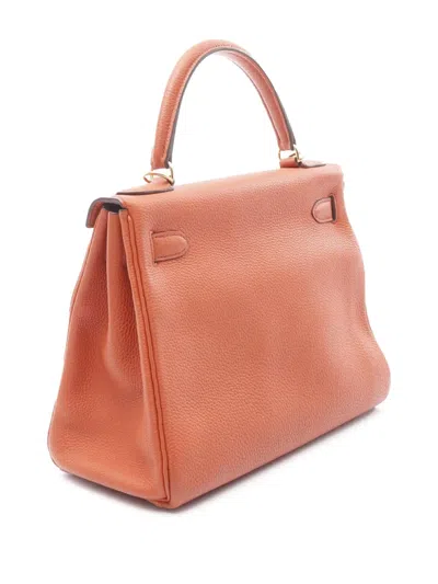 Pre-owned Hermes 2016 Togo Kelly Ii Retourne 28 Satchel In Orange