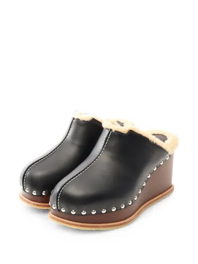 Pre-owned Hermes 2020s Earth Shearling Mules In Black