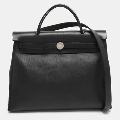 Pre-owned Hermes Black Coated Canvas And Leather Limited Edition Herbag Zip 31 Bag