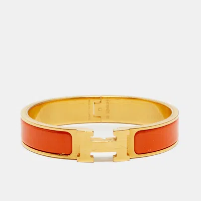 Pre-owned Hermes Hermès Bracelet Clic H Orange Enamel Gold Plated Bracelet