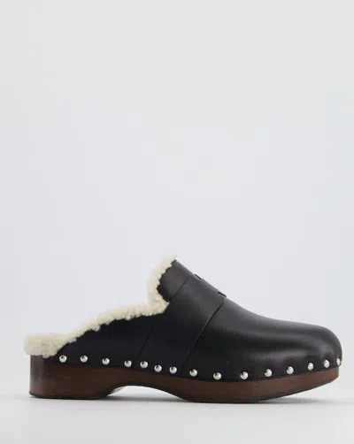 Hermes Calya Mule In Calfskin With Shearling Lining, Tone-on-tone "h" Cut-out Detail And Beechwood Sole In Black