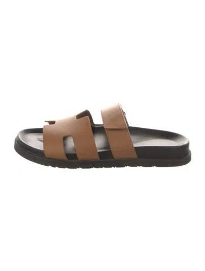Pre-owned Hermes Chypre Leather Slides In Brown
