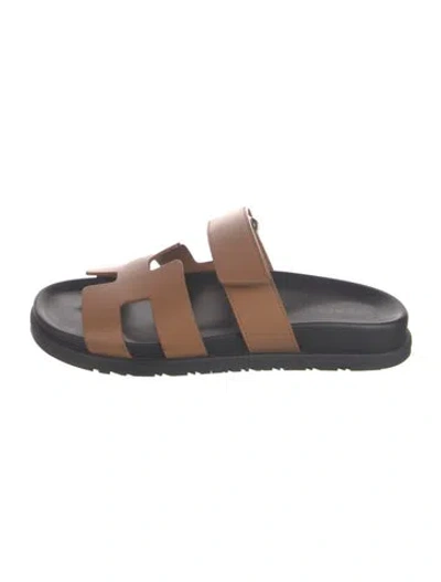 Pre-owned Hermes Chypre Leather Slides In Brown