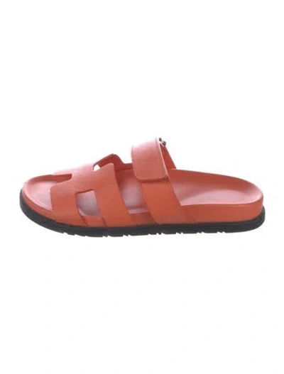 Pre-owned Hermes Chypre Leather Slides In Orange