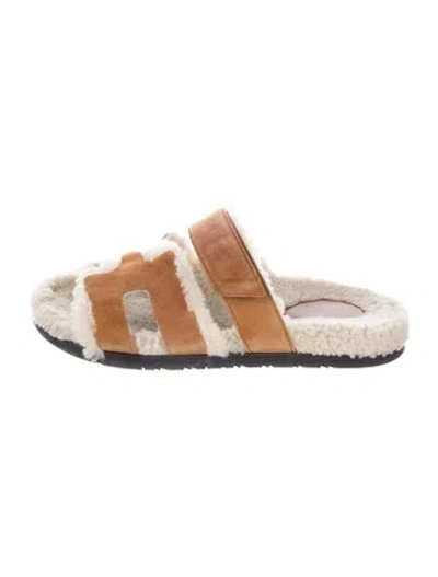 Pre-owned Hermes Chypre Shearling Slides In Brown