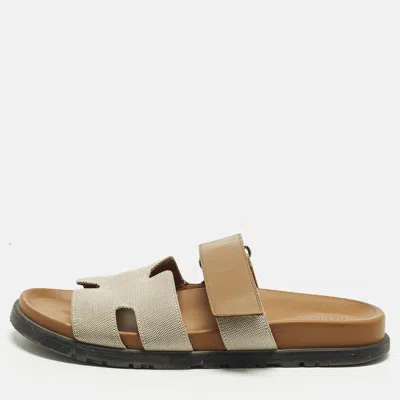 Pre-owned Hermes Chypre Size 40.5 Beige/tan Canvas And Leather Flat Slide In Sand