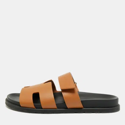 Pre-owned Hermes Chypre Size 44 Tan Leather Flat Slide In Brown