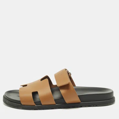 Pre-owned Hermes Chypre Size 44 Tan Leather Flat Slide In Brown