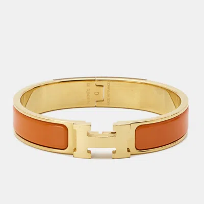Pre-owned Hermes Clic H Orange Enamel Gold Plated Bracelet