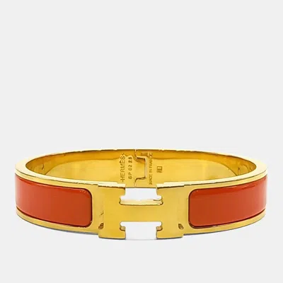 Pre-owned Hermes Hermès Click H Gold Orange Resin Bracelet