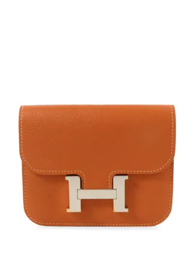 Pre-owned Hermes Constance Slim Bifold Leather Wallet In Orange