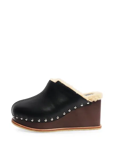 Pre-owned Hermes Earth Studded Mules In Black