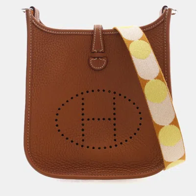 Pre-owned Hermes Evelyne Tpm 16 Gold Taurillon Clemence Leather Crossbody Bag In Brown