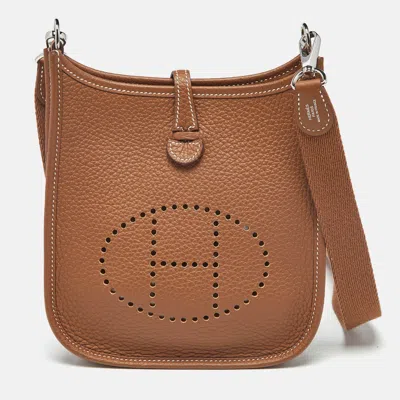Pre-owned Hermes Hermès Gold Taurillon Clemence Leather Evelyne Tpm Bag In Brown