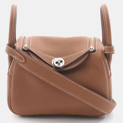 Pre-owned Hermes Gold Taurillon Clemence Leather Lindy Mini Shoulder Bag In Brown