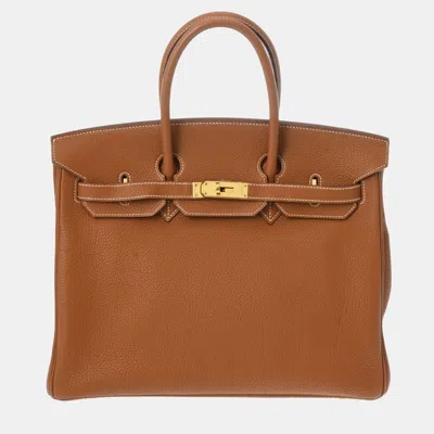 Pre-owned Hermes Gold Togo J Stamp Birkin Handbag In Brown