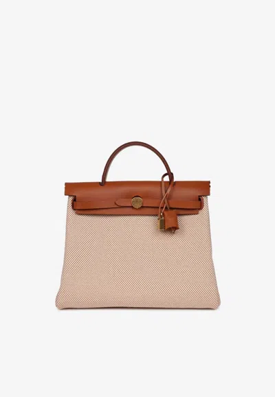 Hermes Herbag 31 Top Handle Bag In Ecru And Beige Toile And Fauve Vache Hunter In Sand