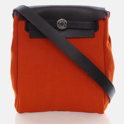 Pre-owned Hermes Herbag Tpm Orange Canvas Bag