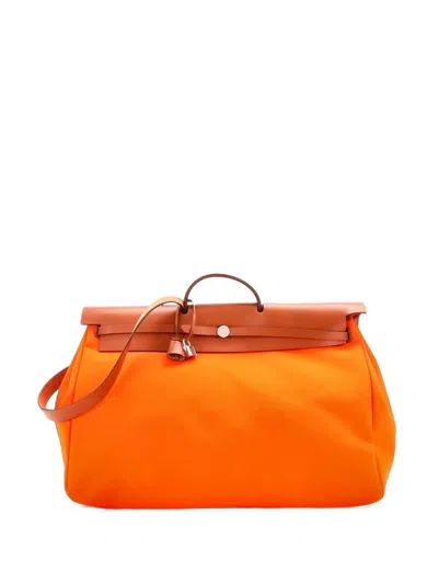 Pre-owned Hermes Herbag Zip Leather And Toile 50 Satchel In Orange