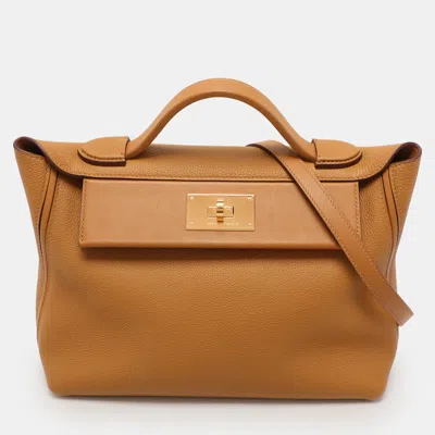 Pre-owned Hermes Jaune Ambre Togo And Swift Leather Gold Tone Finish 24/24 29 Bag In Yellow