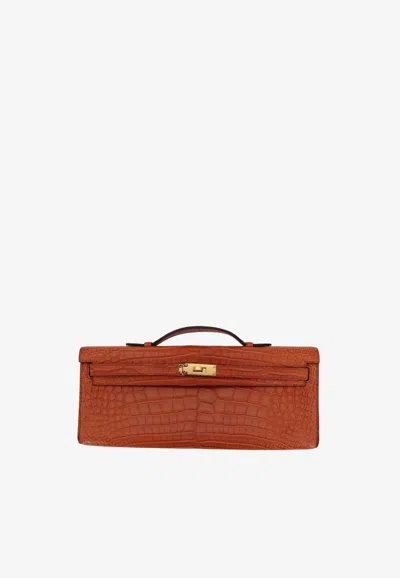 Hermes Kelly Cut Clutch In Gold Matte Alligator With Gold Hardware In Brown