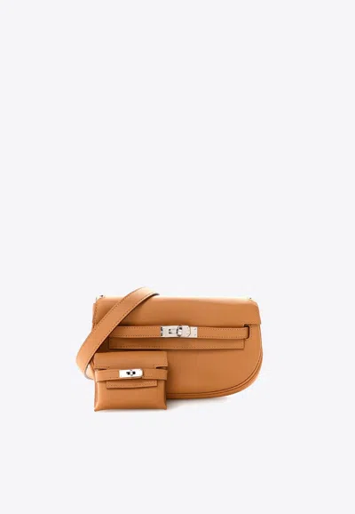 Hermes Kelly Moove In Sesame Swift Leather With Palladium Hardware In Brown