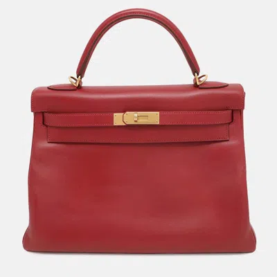 Pre-owned Hermes Kelly Retourne 32 Rouge Vif Box Calf Leather Handbag In Red