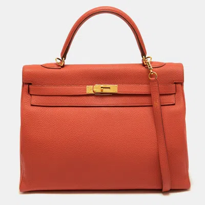 Pre-owned Hermes Kelly Retourne 35 Gold Finish Capucine Togo Leather Top Handle Bag In Orange