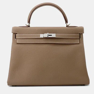 Pre-owned Hermes Kelly Retourne Etoupe Togo Leather Handbag 32 In Brown
