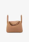 Hermes Lindy 26 In Biscuit Clemence With Gold Hardware In Brown