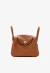 Hermes Lindy 26 In Gold Taurillon Clemence With Palladium Hardware In Gold