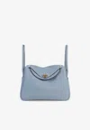 Hermes Lindy 26 In Gris Pantin Taurillon Clemence With Permabrass Hardware In Gray