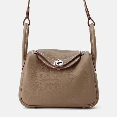 Pre-owned Hermes Lindy Mini Etoupe Taurillon Clemence Bag In Brown