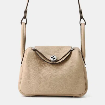 Pre-owned Hermes Lindy Trench/etoupe Taurillon Clemence Size Mini In Sand