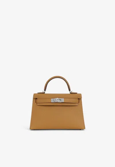 Hermes Mini Kelly Verso In Caramel Chevre And Cacao With Palladium Hardware In Brown