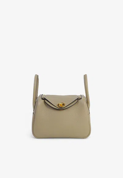 Pre-owned Hermes Mini Lindy 20 Ii In Trench Clemence With Gold Hardware In Brown