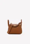 Hermes Mini Lindy 20 In Gold Taurillon Clemence With Gold Hardware In Gold