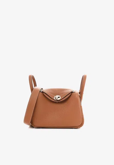 Pre-owned Hermes Mini Lindy 20 In Gold Taurillon Clemence With Palladium Hardware In Brown
