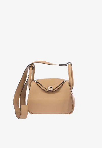 Hermes Mini Lindy Ii In Poussiere Swift Leather With Electrum Hardware In Brown