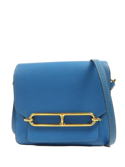 Pre-owned Hermes Mini Roulis Evercolor-leather Crossbody Bag In Blue