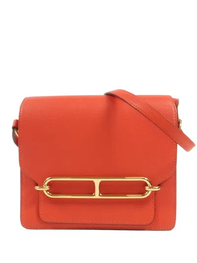 Pre-owned Hermes Mini Roulis Evercolor-leather Crossbody Bag In Red