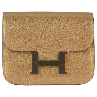 Pre-owned Hermes Hermès New Gold Constance Slim Wallet In Brown