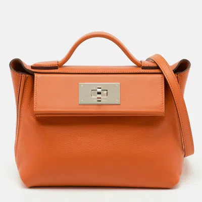 Pre-owned Hermes Hermès Orange Evercolor And Swift Leather Silver Finish 24/24 21 Bag