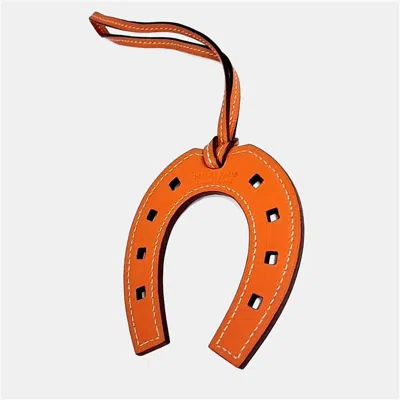 Pre-owned Hermes Orange Leather Horseshoe Bag Charm