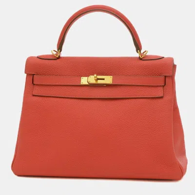 Pre-owned Hermes Rose Jaipur Taurillon R Stamp Kelly Handbag In Red