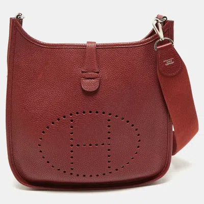 Pre-owned Hermes Rouge Casaque Taurillon Clemence Leather Evelyne Iii Pm Bag In Red