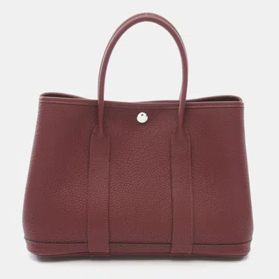 Pre-owned Hermes Rouge H Negonda Leather Garden Party Tpm In Red