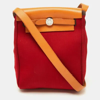 Pre-owned Hermes Rouge Imperial/natural Canvas And Leather 2-in-1 Herbag Tpm Bag In Red